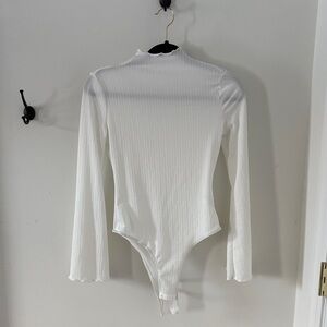 White Amazon bodysuit, size small.